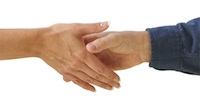 Man and woman shaking hands isolated on a white background.